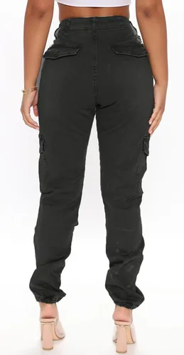 Vista 2 de Pantalones rotos acampanados para mujer con cintura elástica y dobladillo deshilachado