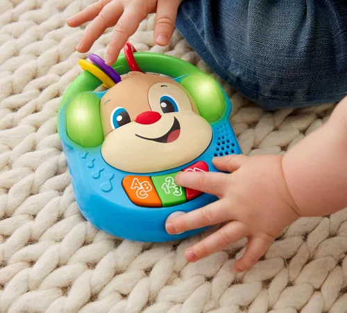 Vista 5 de Fisher-Price Laugh & Learn - Juguete para bebés y niños pequeños, reproductor de música para cantar y aprender, radio de simulación con luces