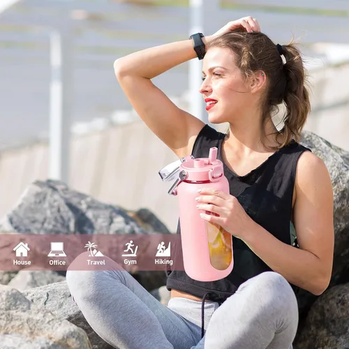 Vista 5 de BLUEGO Botella de agua de vidrio de 64 onzas con mango de acero inoxidable, botella de agua grande con marcadores de tiempo y funda de silicona